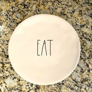 Eight Rae Dunn Dinner Plates